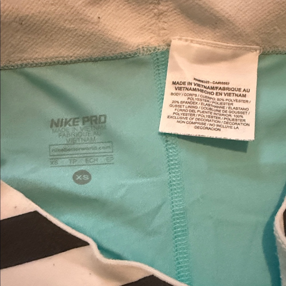Nike Pro Diagonal Striped Capri Leggings in Black and Aqua - Picture 2 of 2